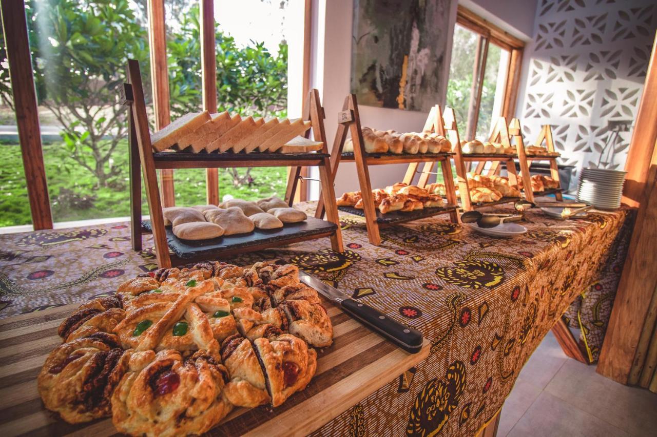 Zanzibella Hotel & Spa Kiwengwa  Bagian luar foto A selection of pastries at a buffet