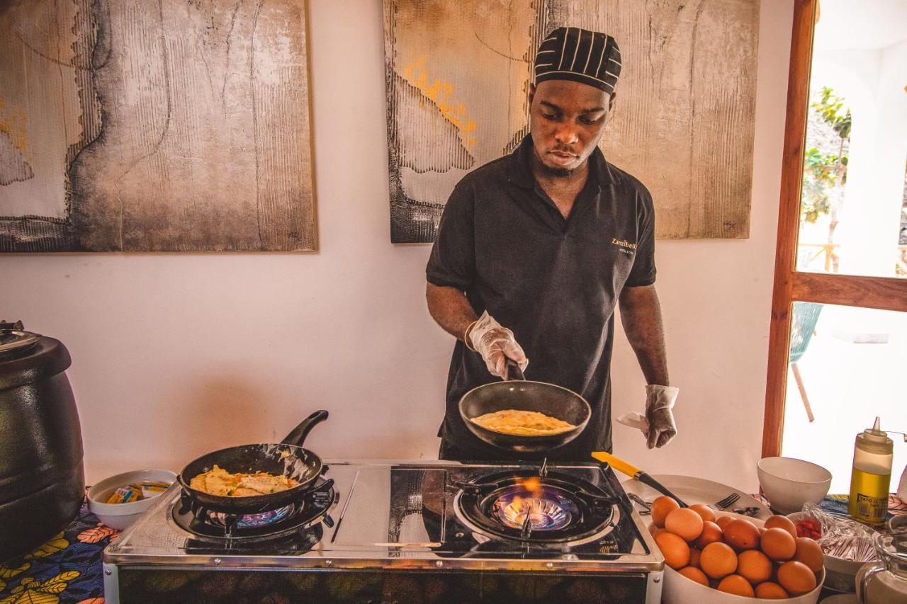 Zanzibella Hotel & Spa Kiwengwa  Bagian luar foto A chef cooking